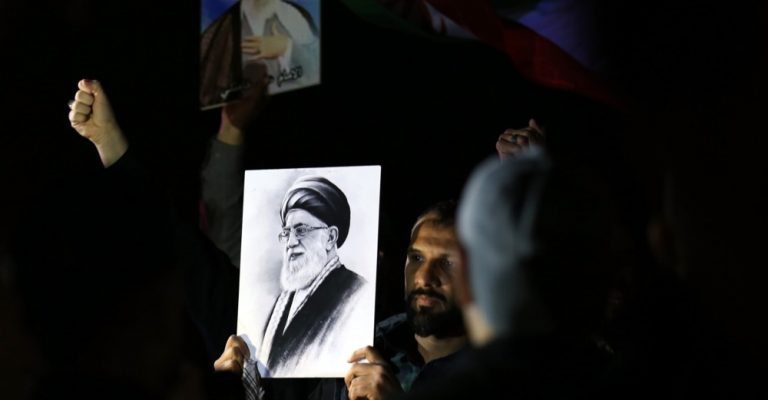 protest-bagdad-hamnei-epa.jpg