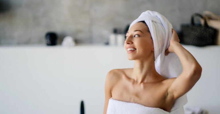 tusiranje-relaxed-young-caucasian-female-model-white-towel-feels-refreshed-after-taking-shower-has-h.jpeg