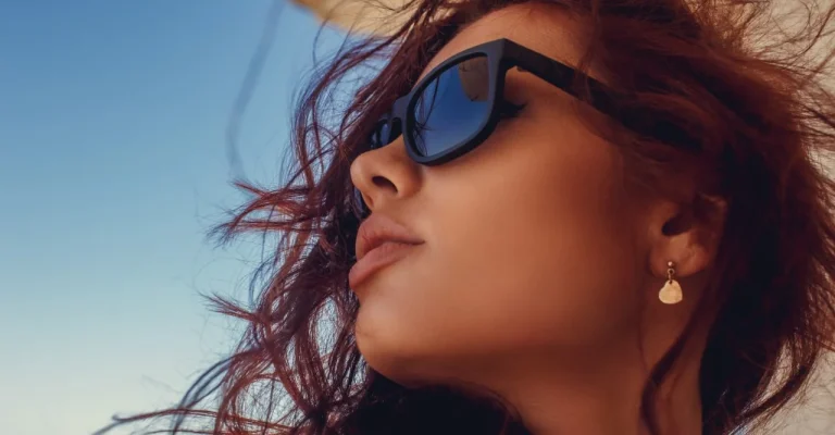 zena-ocilaportrait-woman-with-red-hair-sunglasses.webp.webp